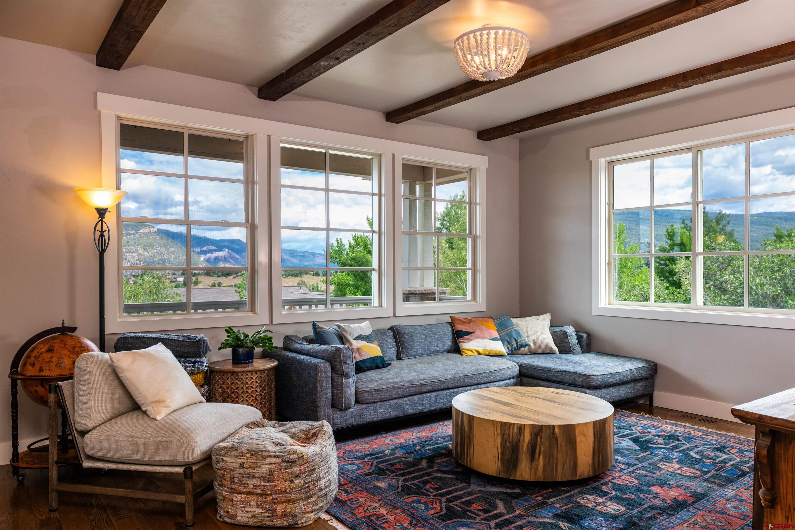 22 Kennebec Drive Durango, CO 81301 - Photo 17 of 34 a living room with furniture and a large window