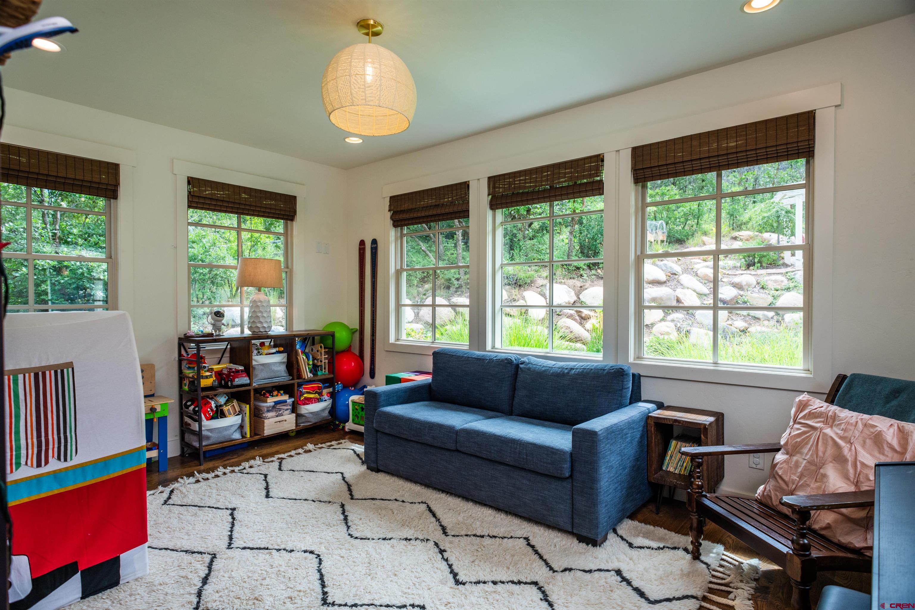 22 Kennebec Drive Durango, CO 81301 - Photo 22 of 34 a living room with furniture and a window