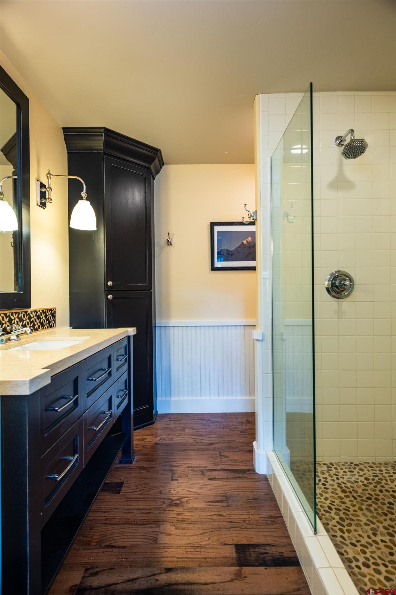 22 Kennebec Drive Durango, CO 81301 - Photo 25 of 34 a bathroom with a double vanity sink toilet and shower