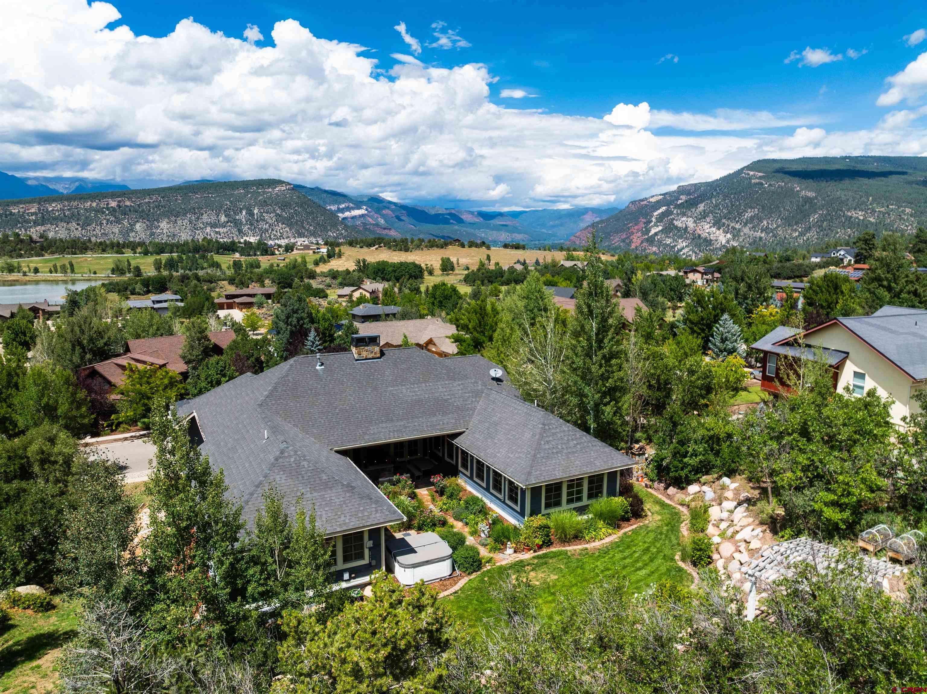 22 Kennebec Drive Durango, CO 81301 - Photo 32 of 34 an aerial view of a house with a yard and lake view