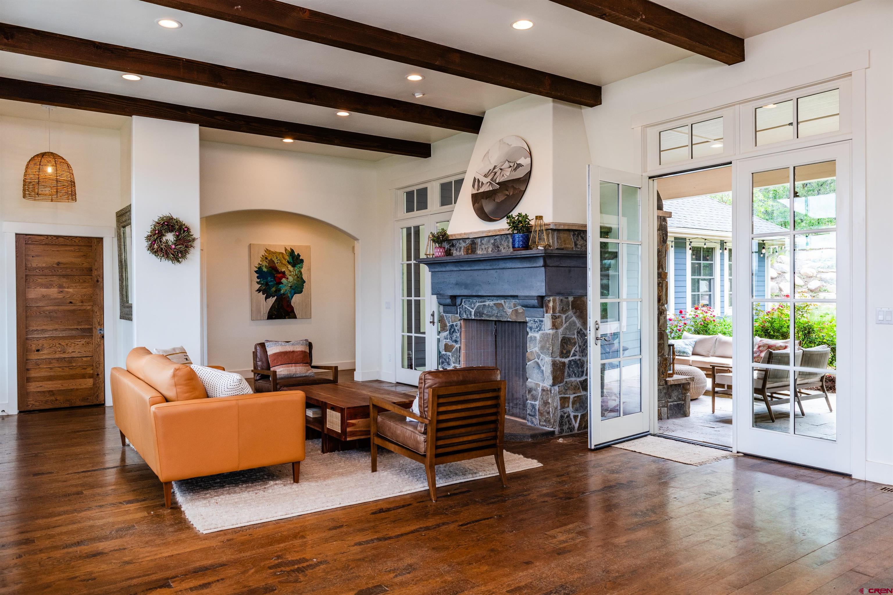 22 Kennebec Drive Durango, CO 81301 - Photo 6 of 34 a living room with furniture and a fireplace