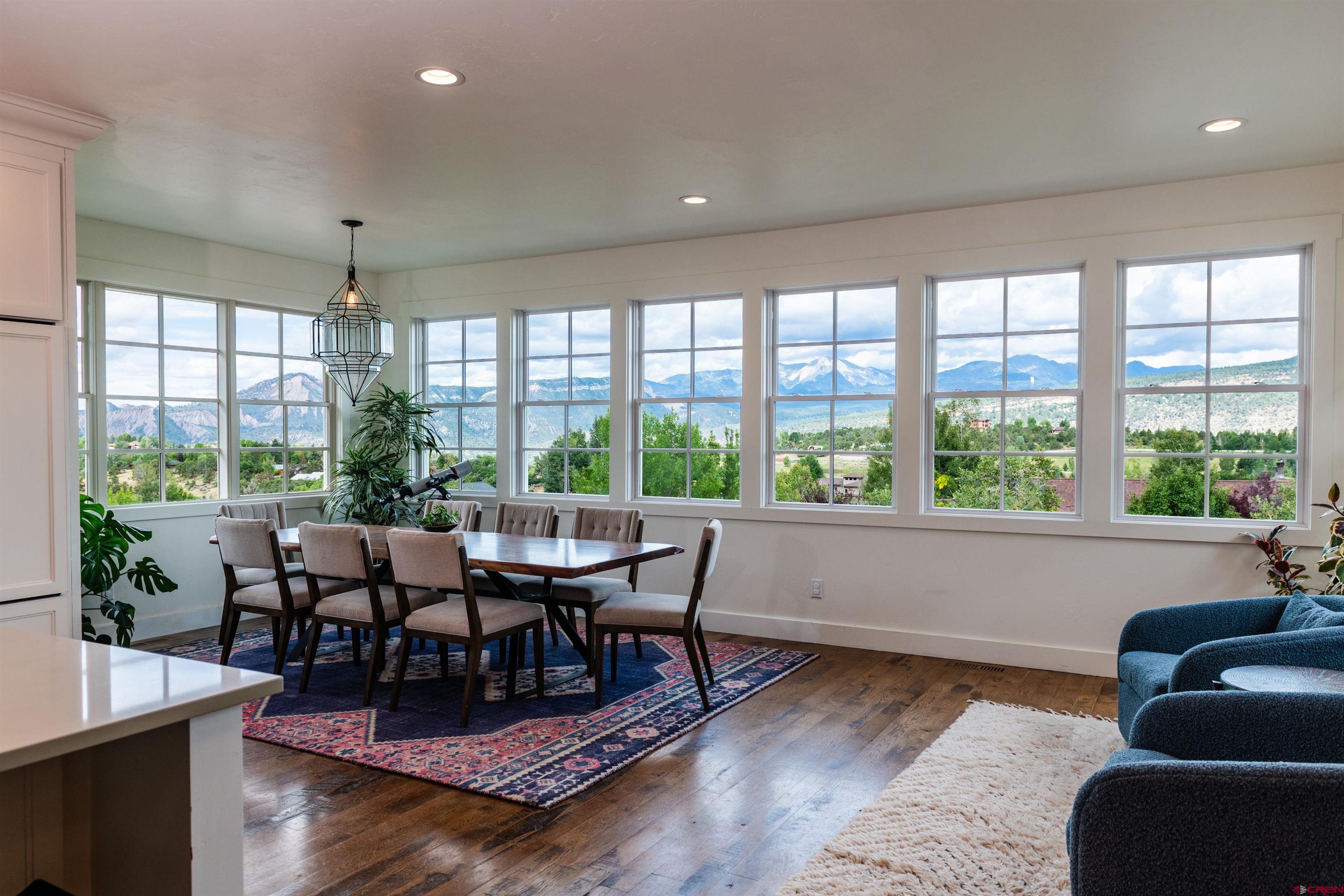 22 Kennebec Drive Durango, CO 81301 - Photo 8 of 34 a living room with furniture and a large window