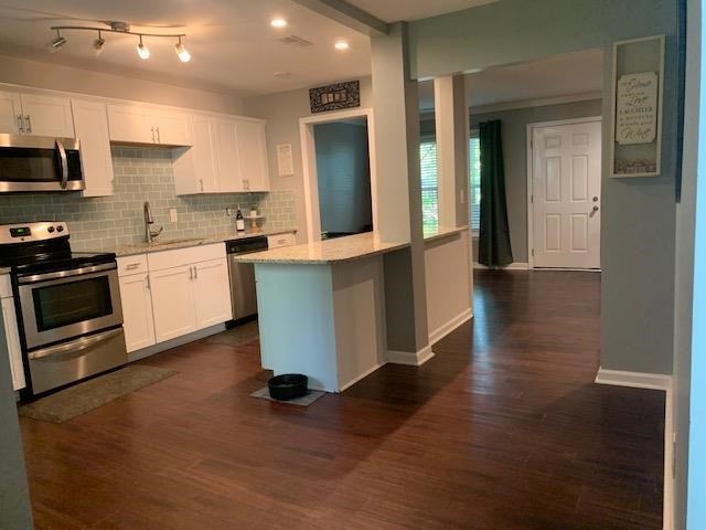 233 Wetherburn Lane Raleigh, NC 27615 - Photo 3 of 10 large kitchen with stainless steel appliance and granite counter