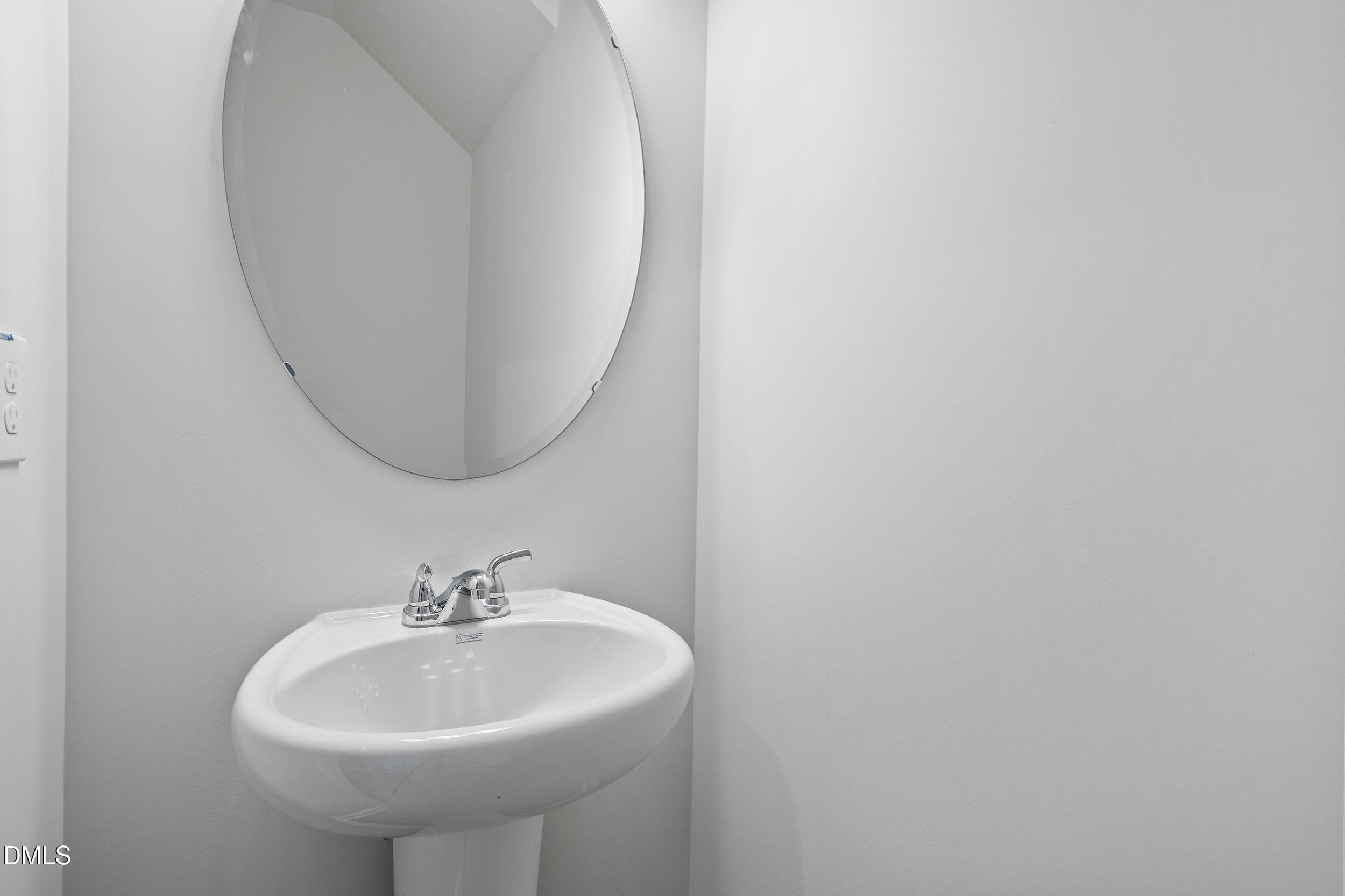 248 Alice Trace Place Angier, NC 27501 - Photo 15 of 32 a sink with a mirror