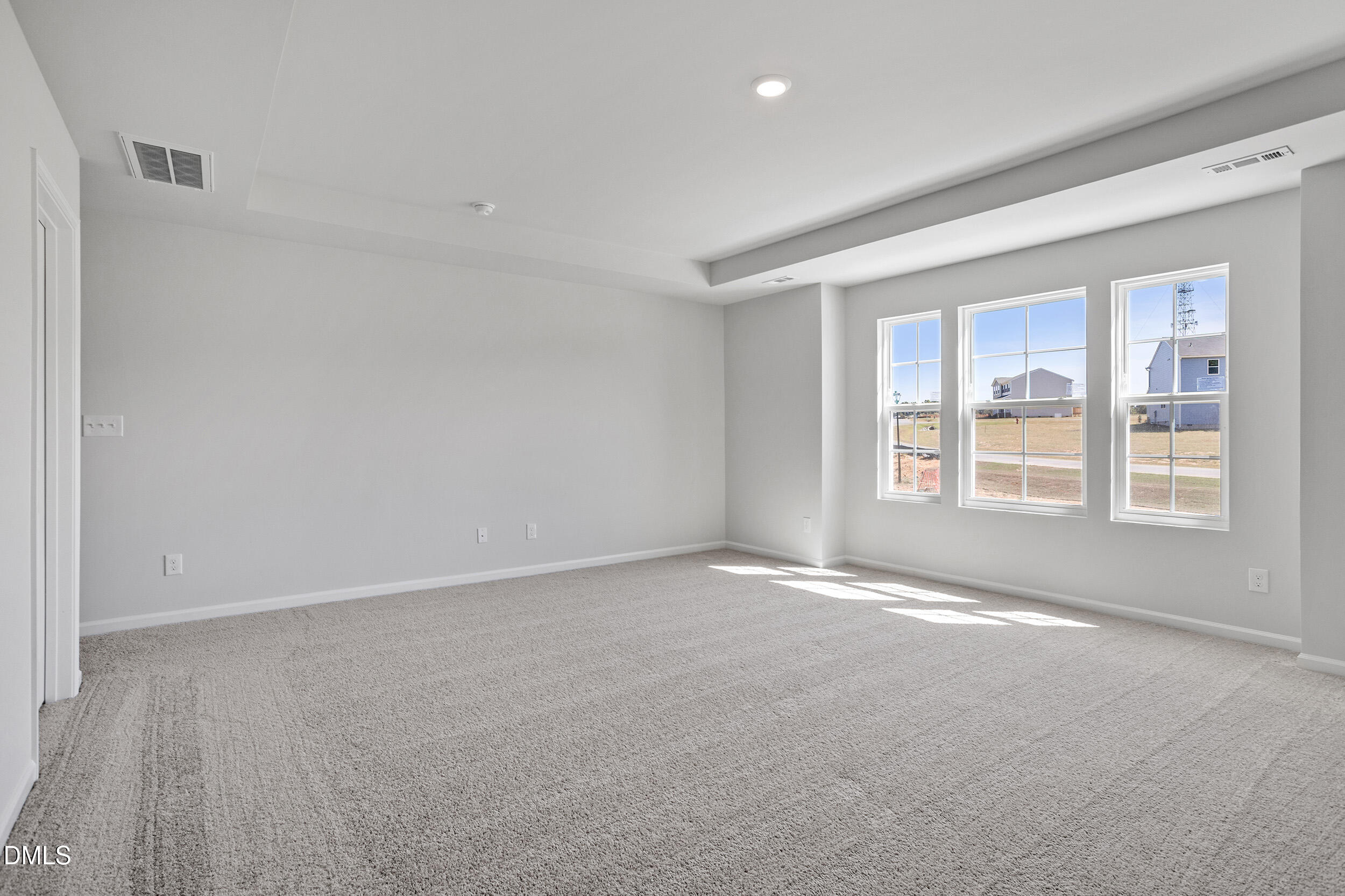 248 Alice Trace Place Angier, NC 27501 - Photo 19 of 32 a view of an empty room with a window