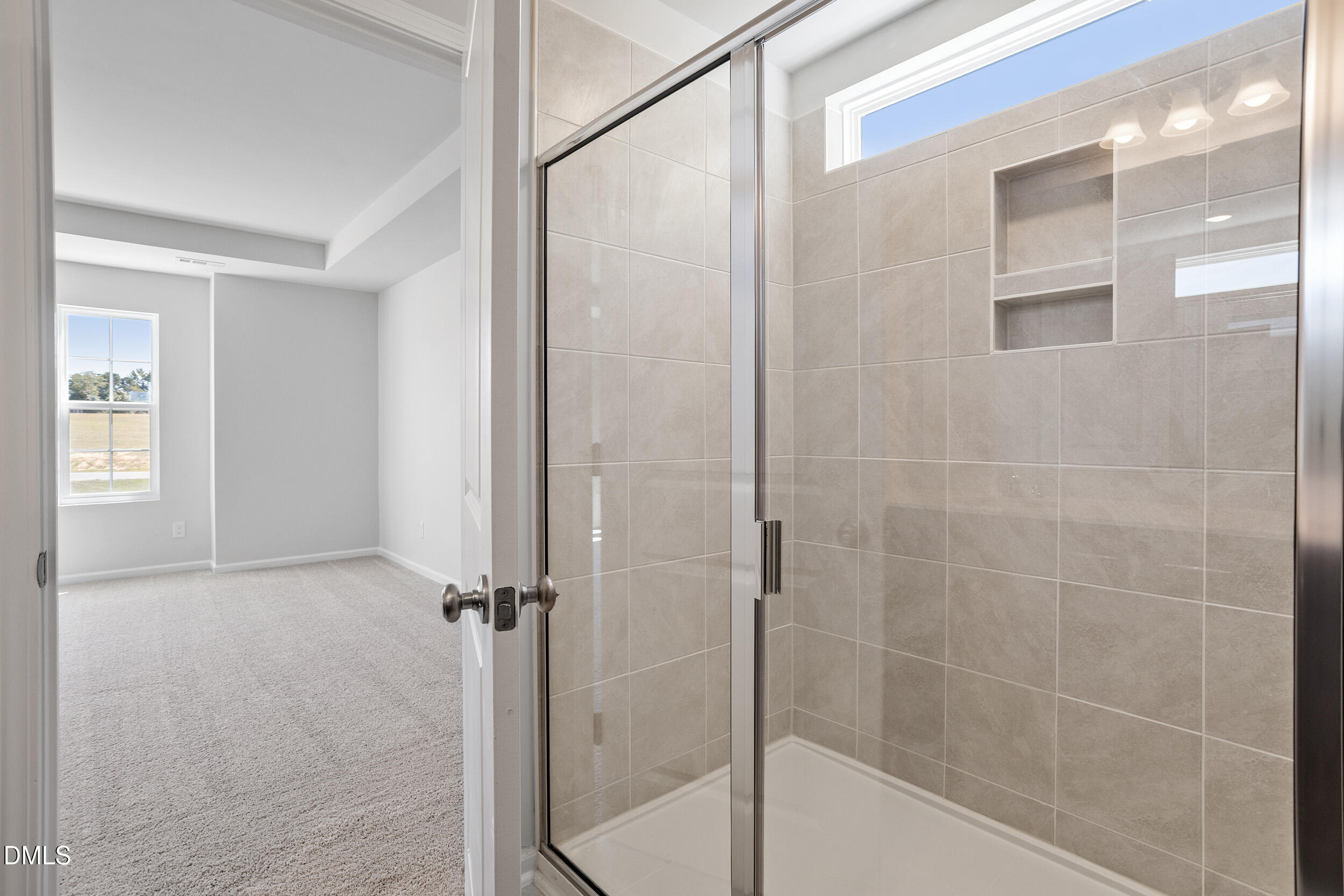 248 Alice Trace Place Angier, NC 27501 - Photo 21 of 32 a bathroom with a shower