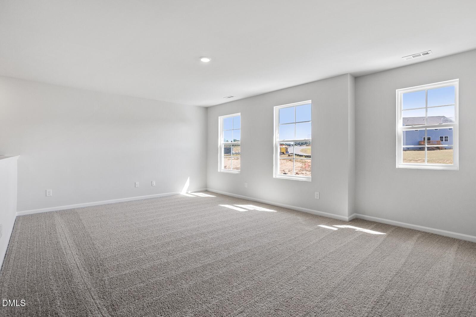248 Alice Trace Place Angier, NC 27501 - Photo 22 of 32 a view of an empty room with a window