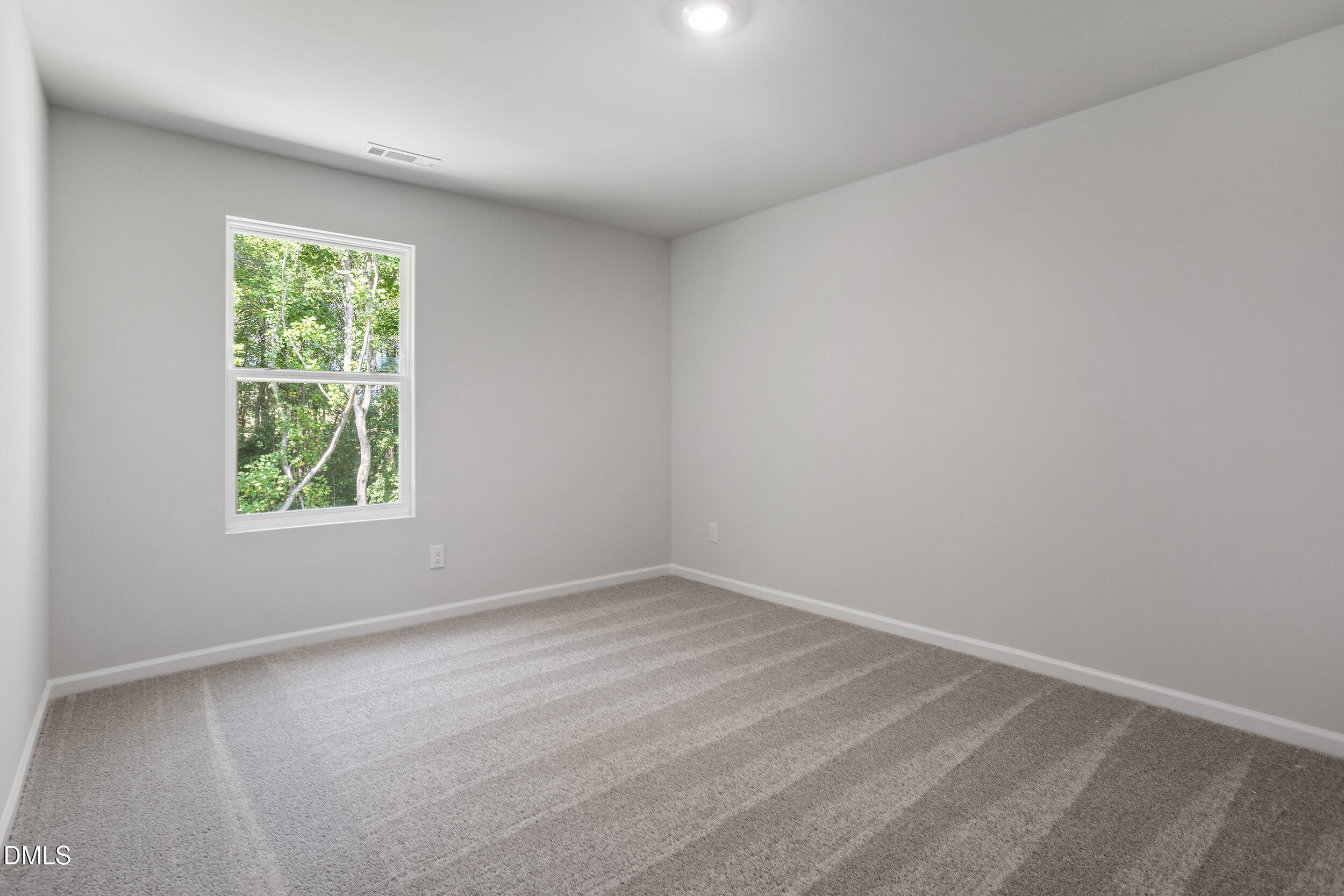 248 Alice Trace Place Angier, NC 27501 - Photo 25 of 32 an empty room with a window