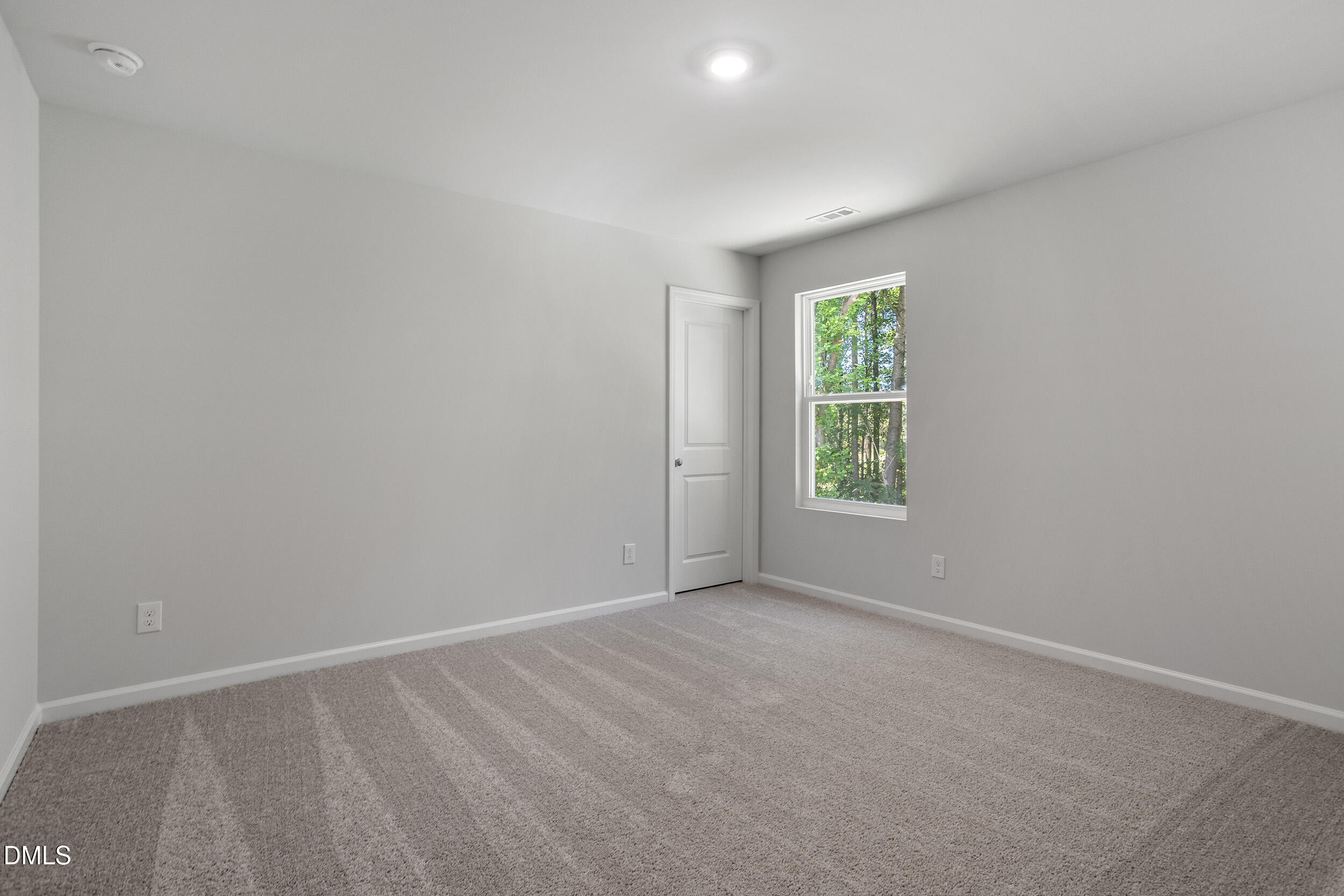 248 Alice Trace Place Angier, NC 27501 - Photo 28 of 32 an empty room with windows
