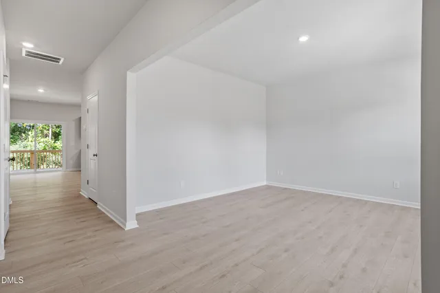 a picture of a book and a white bed