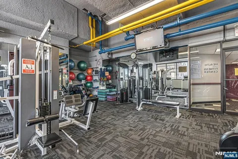 a view of a room with gym equipment