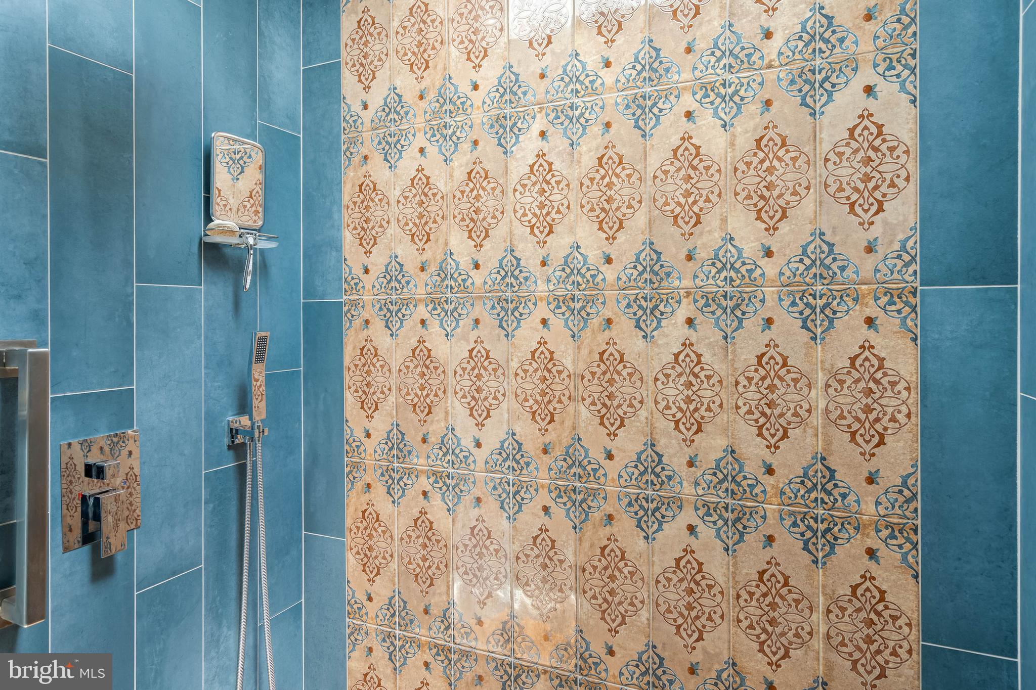 35645 Elk Camp Road Rehoboth Beach, DE 19971 - Photo 30 of 59 a bathroom with a shower curtain and a shower curtain
