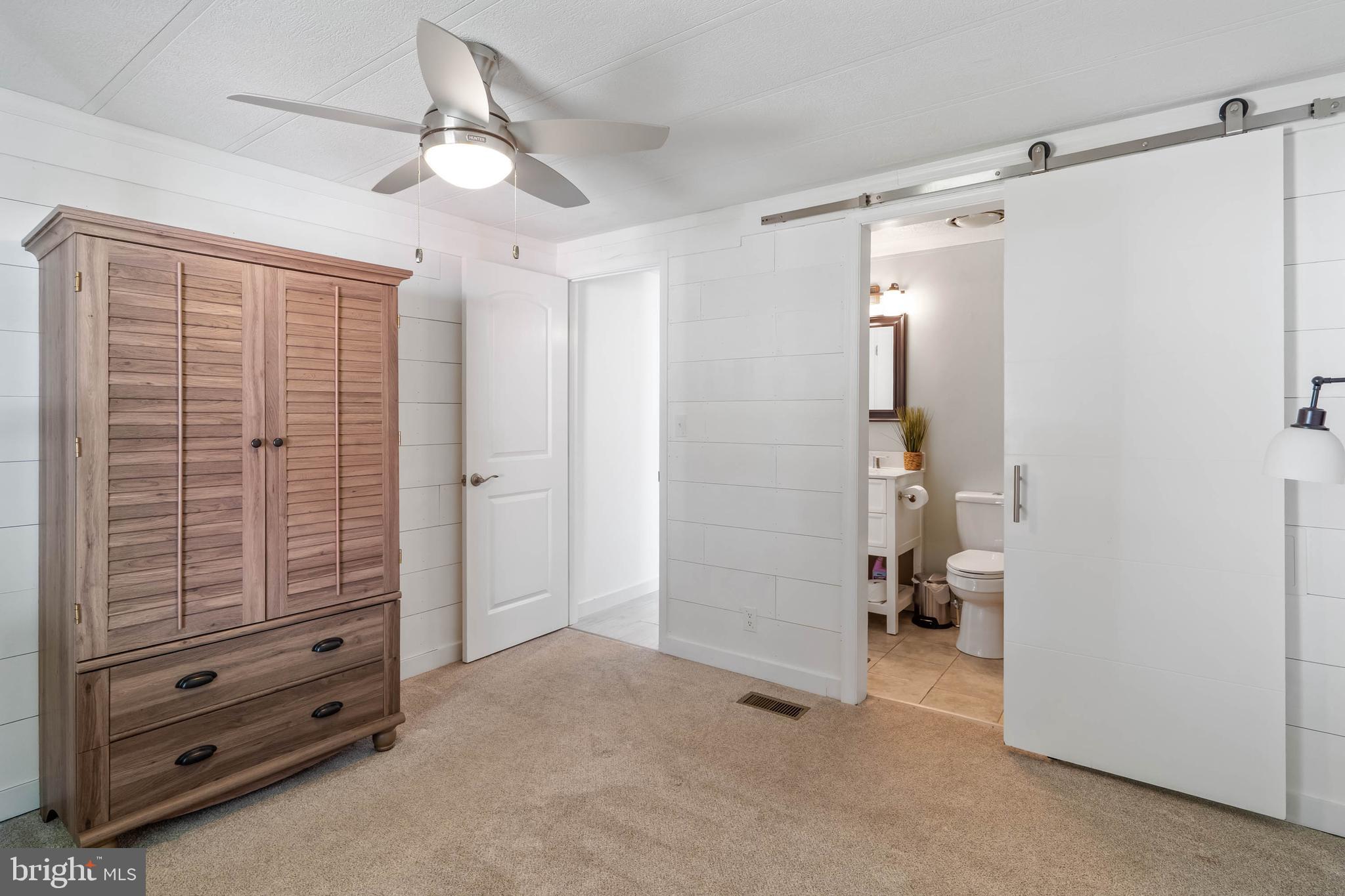 35645 Elk Camp Road Rehoboth Beach, DE 19971 - Photo 38 of 59 a view of walk in closet