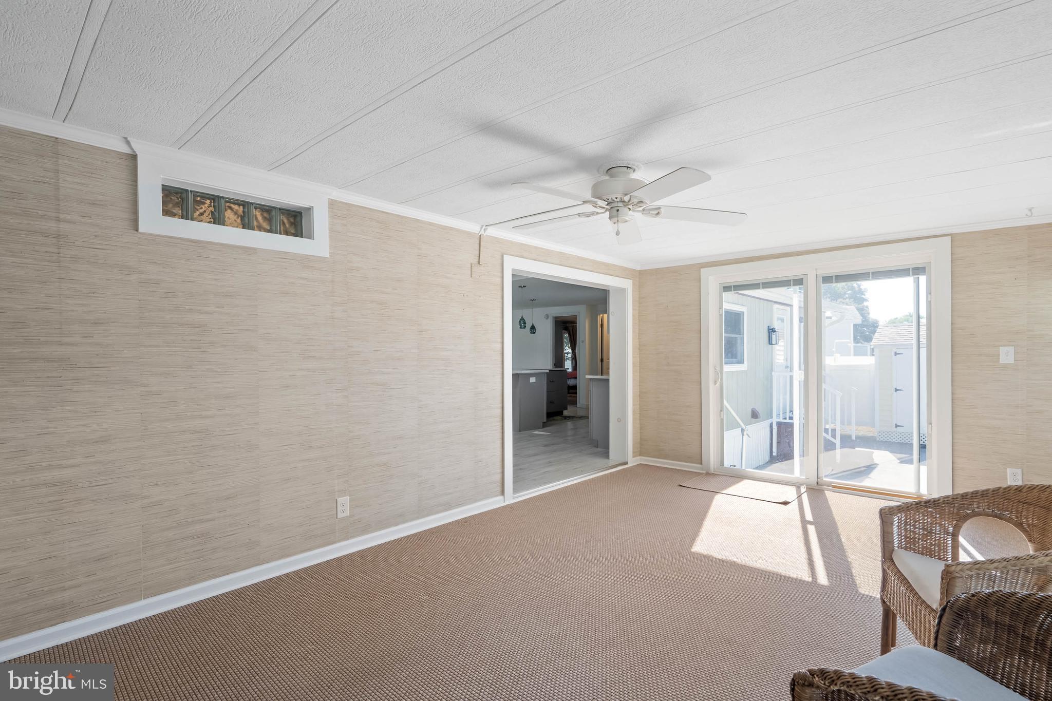 35645 Elk Camp Road Rehoboth Beach, DE 19971 - Photo 42 of 59 newer sliding door with interior blinds