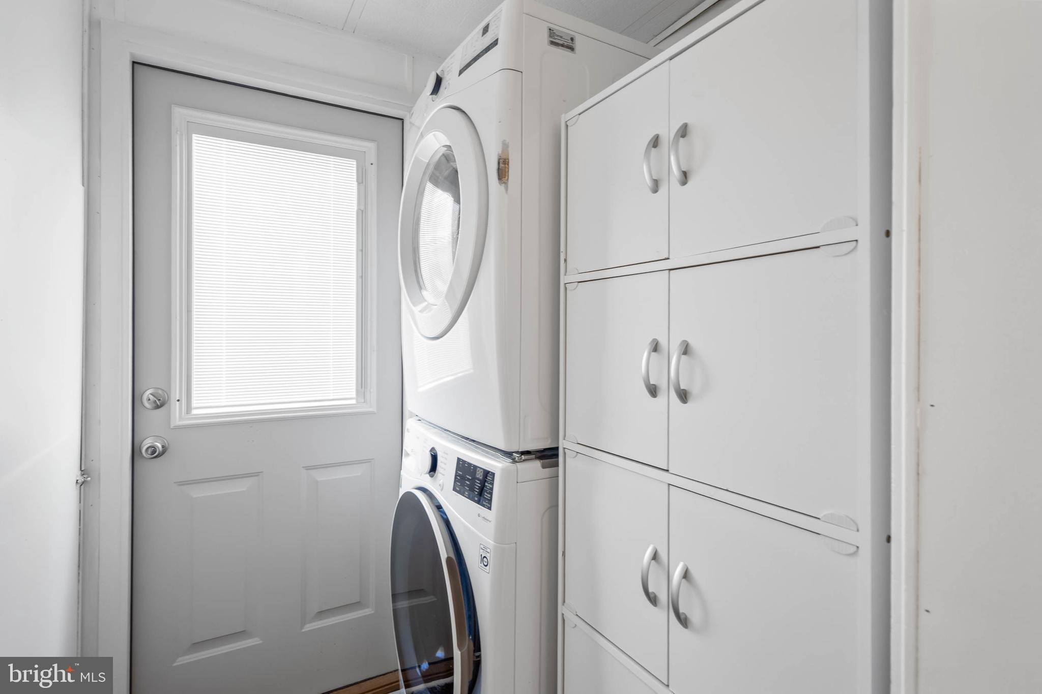35645 Elk Camp Road Rehoboth Beach, DE 19971 - Photo 43 of 59 a bathroom with a shower a mirror and a shower