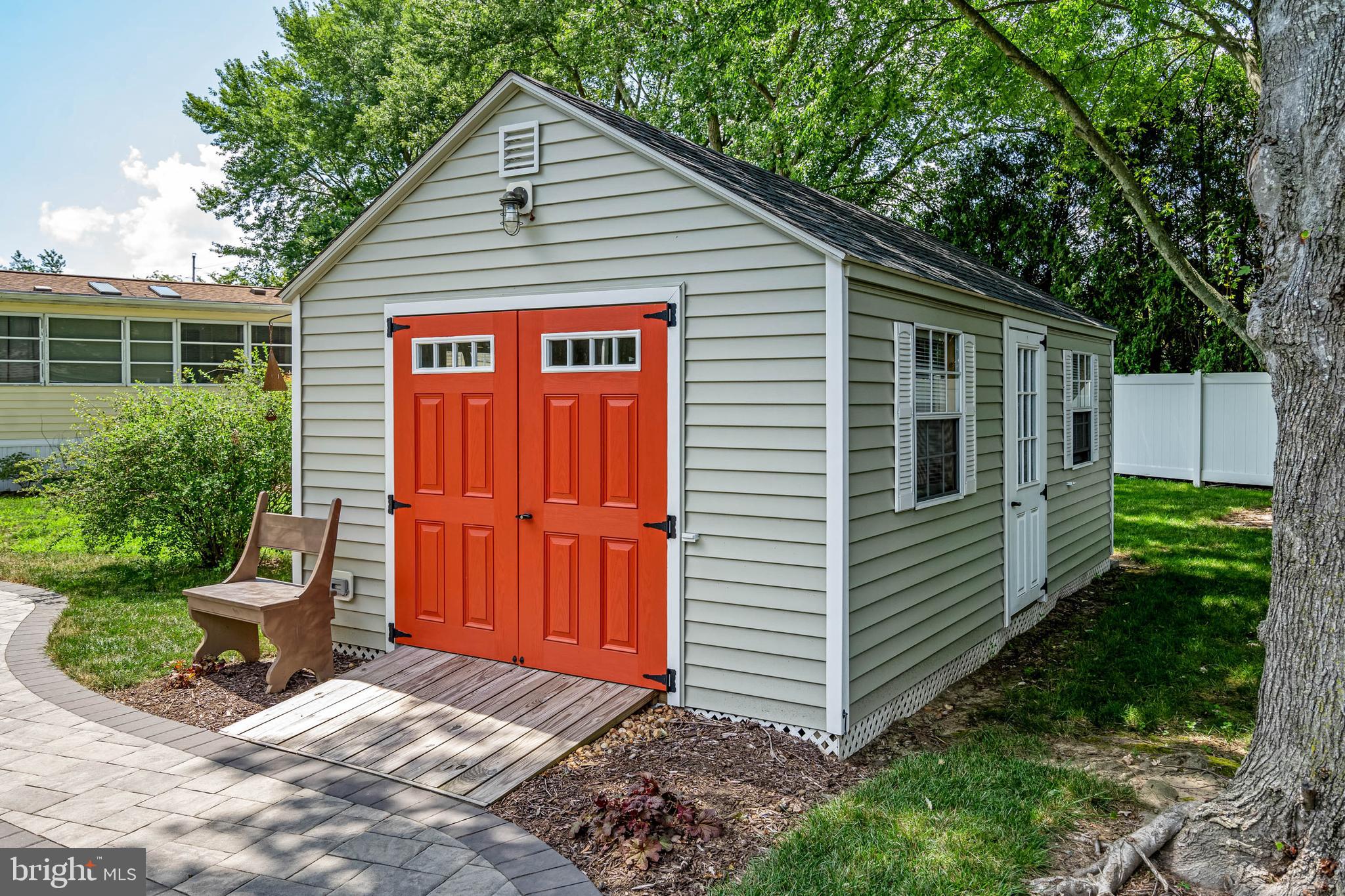 35645 Elk Camp Road Rehoboth Beach, DE 19971 - Photo 49 of 59 a view of a house with a yard