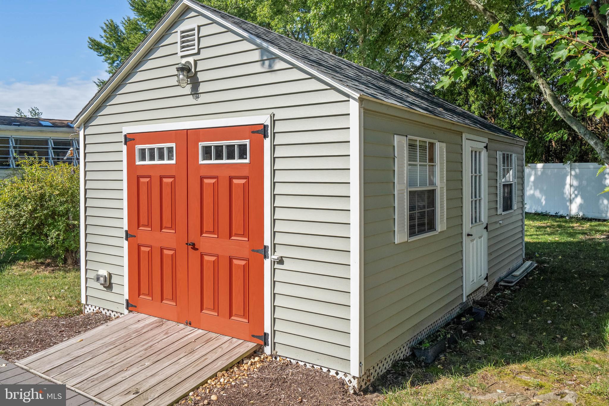 35645 Elk Camp Road Rehoboth Beach, DE 19971 - Photo 51 of 59 a view of a house with a yard
