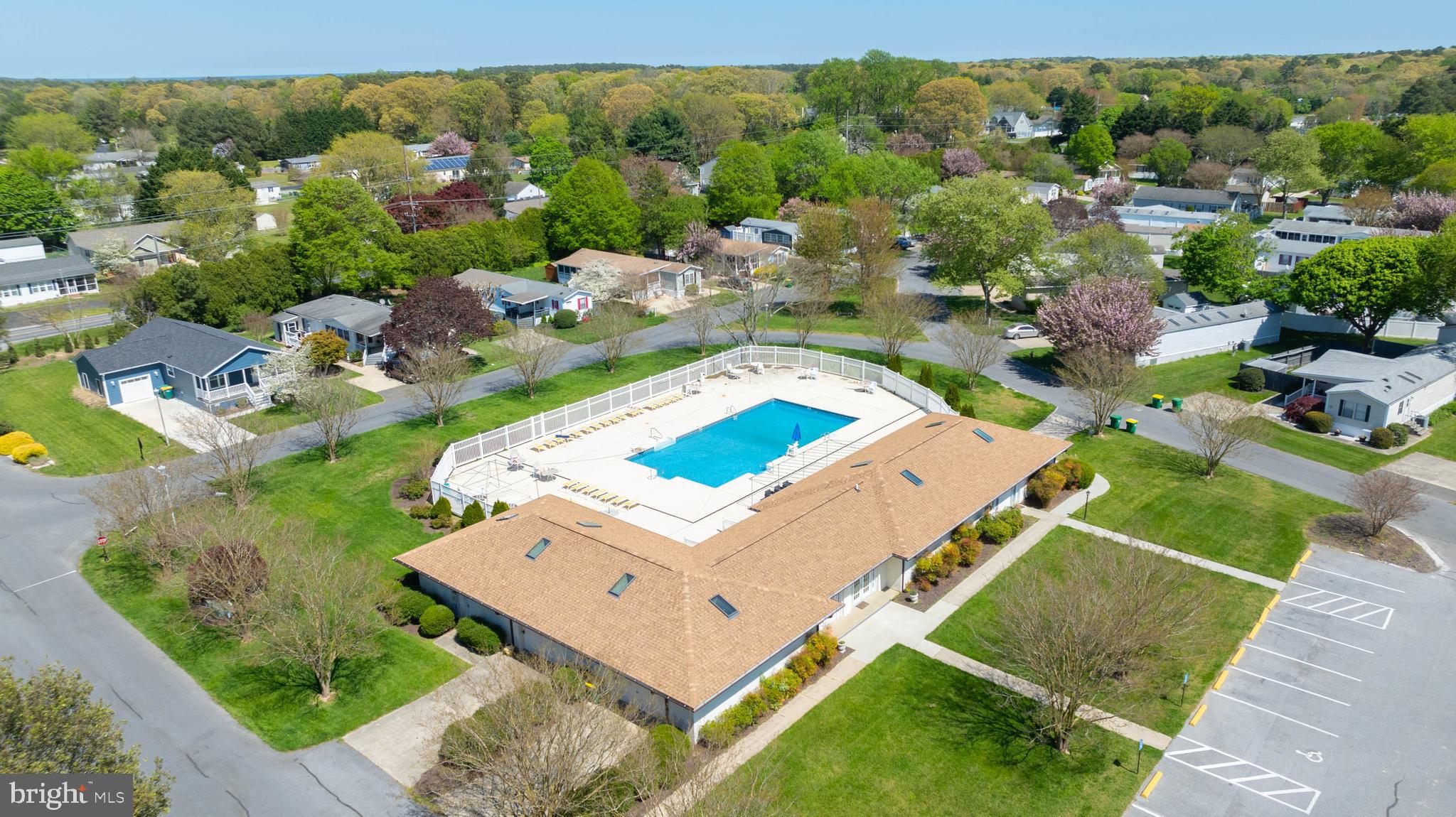 35645 Elk Camp Road Rehoboth Beach, DE 19971 - Photo 59 of 59 an aerial view of a house with a garden