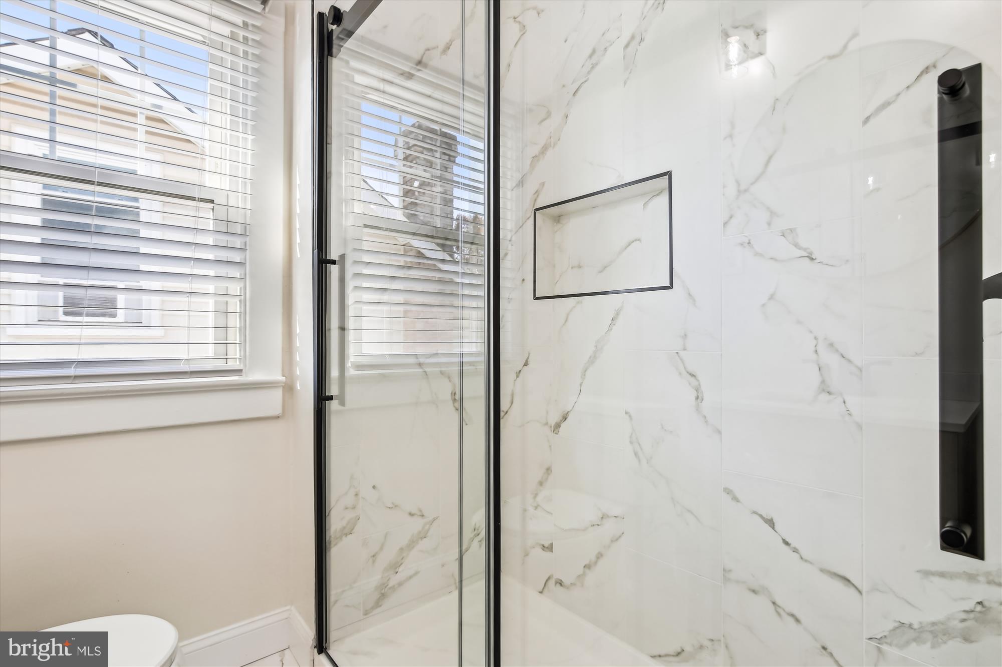 3107 9th Road North Arlington, VA 22201 - Photo 22 of 34 a bathroom with a shower and toilet