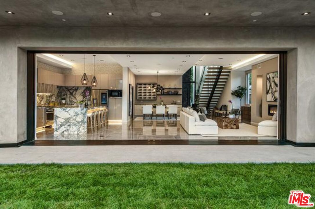 11241 Blix Street Toluca Lake, CA 91602 - Photo 4 of 19 a view of living room and dining room