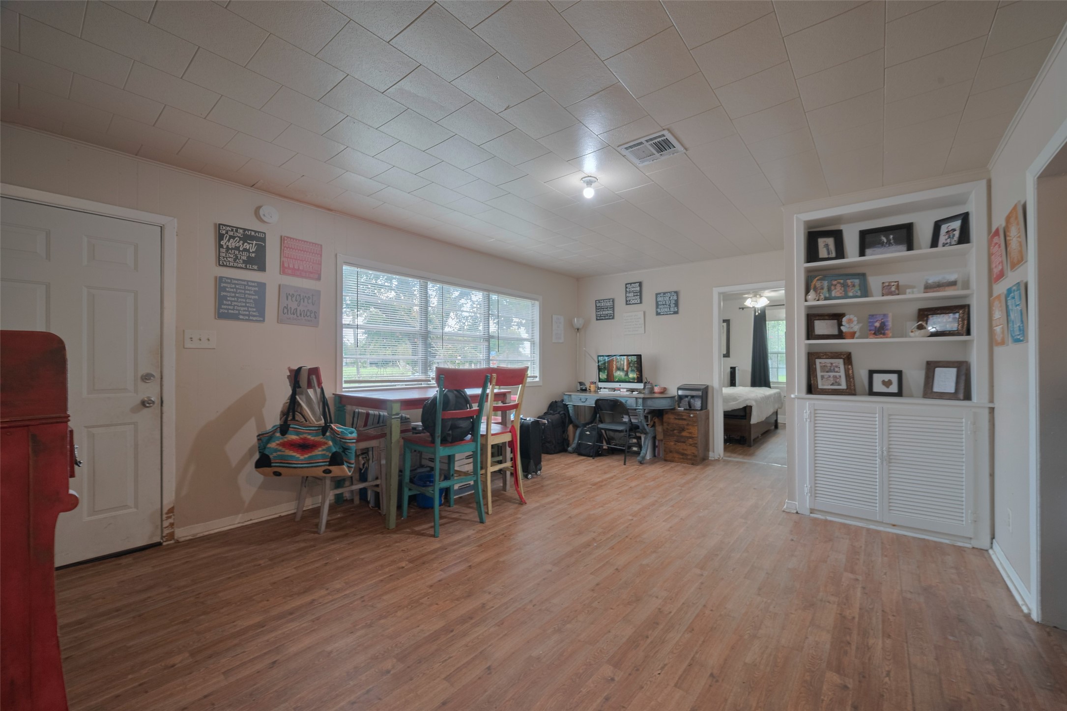 600 Texas Street Wharton, TX 77488 - Photo 13 of 38 a view of a livingroom with furniture and wooden floor