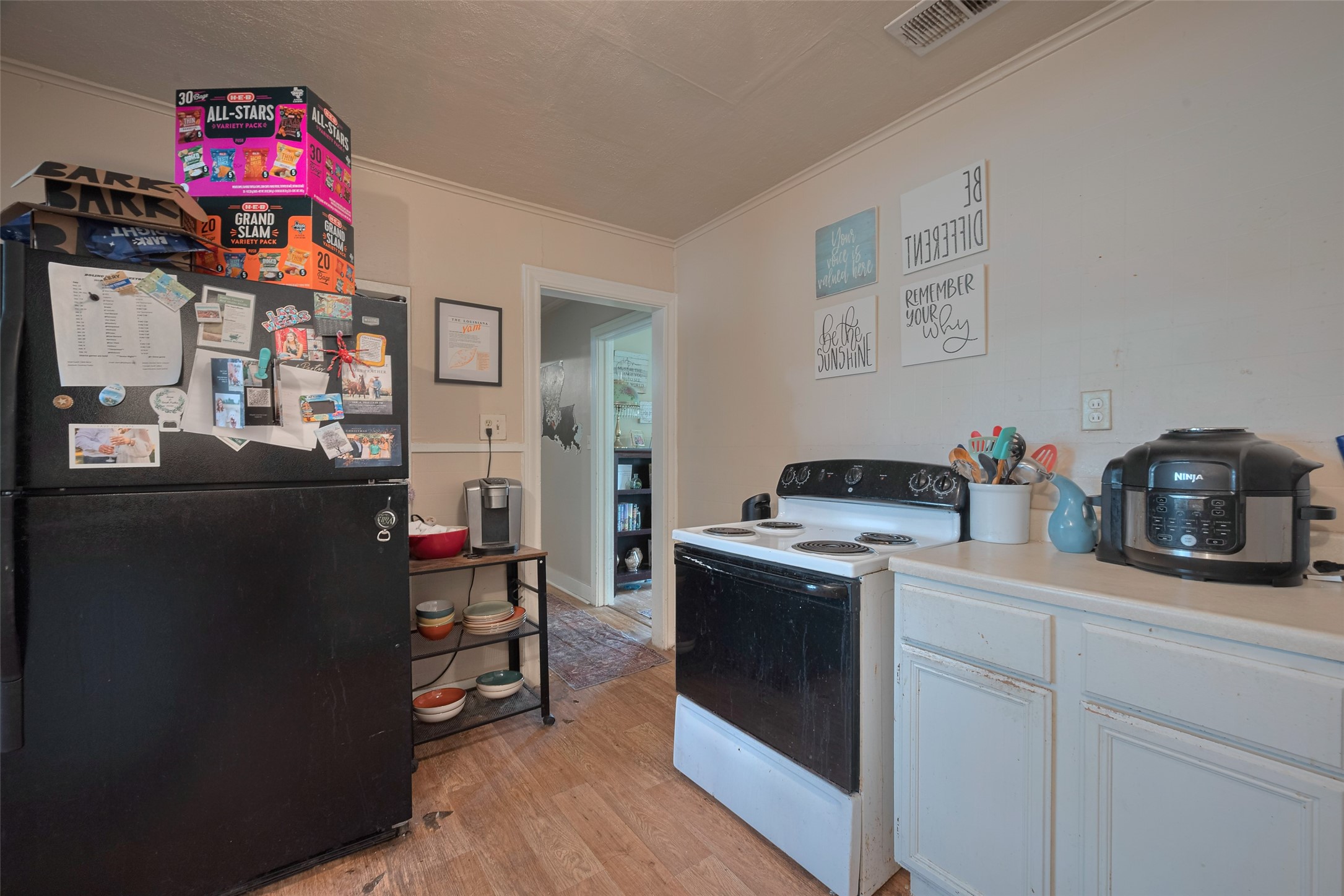 600 Texas Street Wharton, TX 77488 - Photo 20 of 38 a workspace with furniture and wooden floor