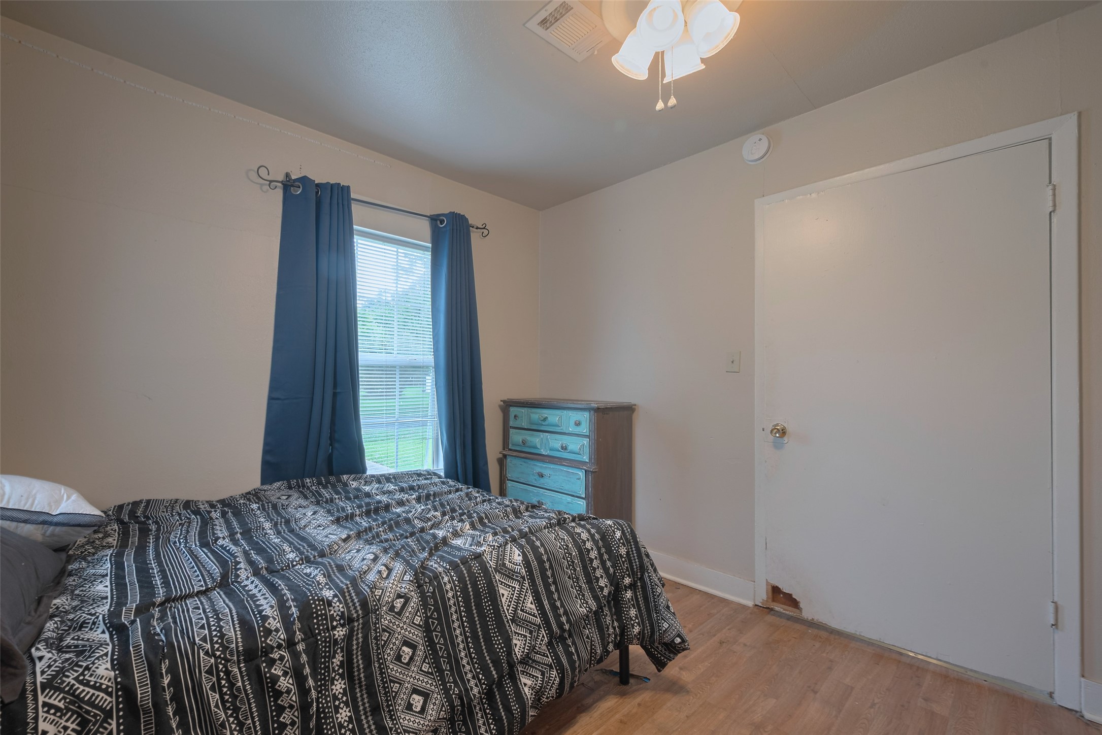 600 Texas Street Wharton, TX 77488 - Photo 25 of 38 a bedroom with a bed and a window