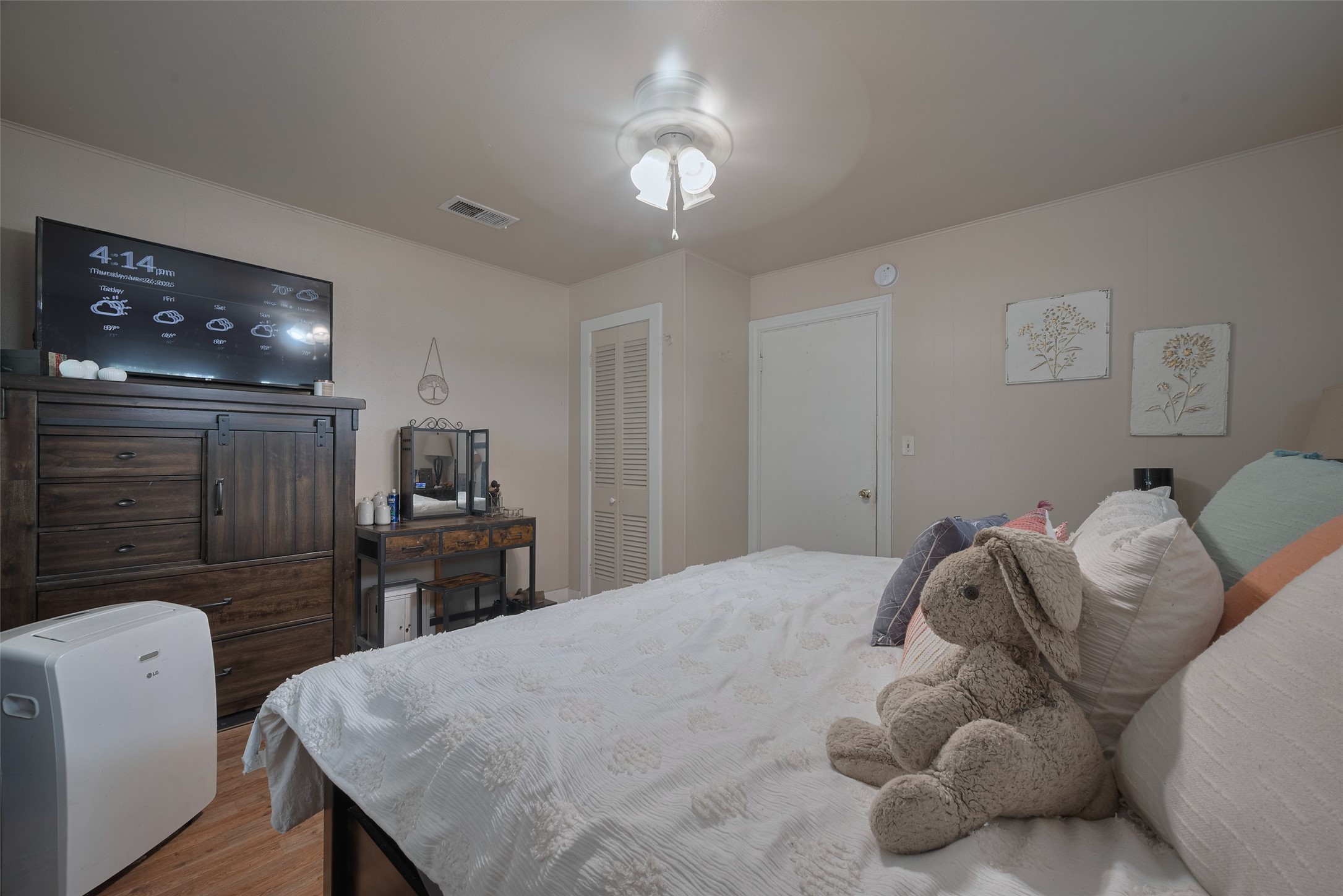 600 Texas Street Wharton, TX 77488 - Photo 31 of 38 a bedroom with a bed and a television