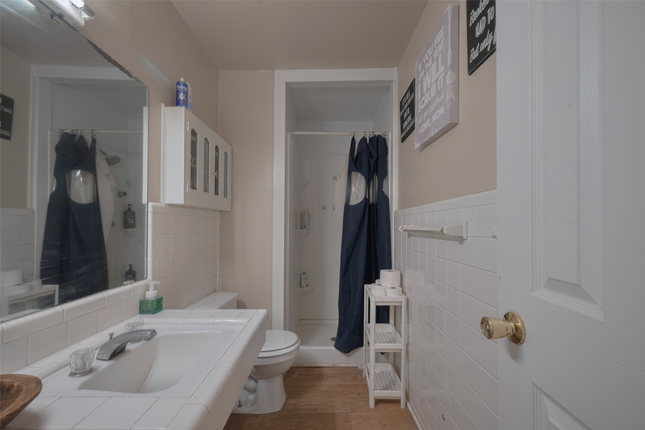 600 Texas Street Wharton, TX 77488 - Photo 33 of 38 a bathroom with a sink toilet and shower