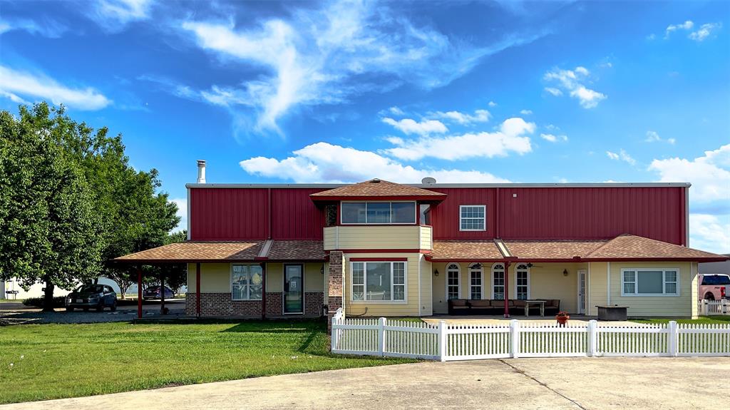 141 Aero Country Road McKinney, TX 75071 - Photo 1 of 1 a front view of a house with garden