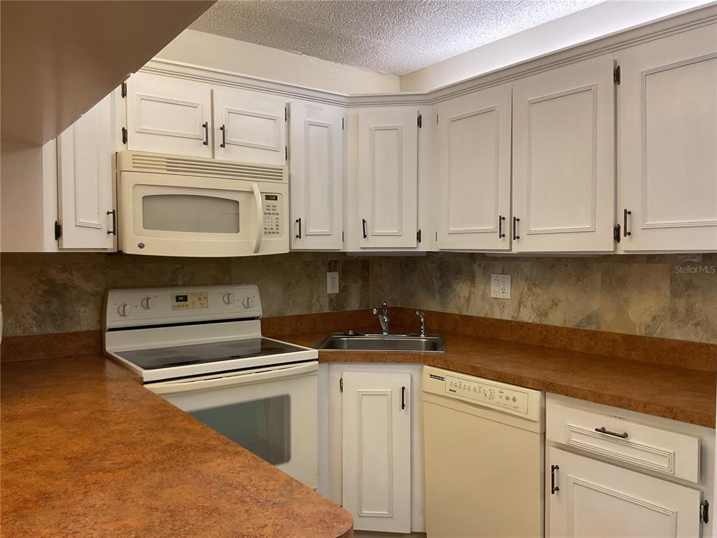 2687 Pine Ridge Way South, Unit H1 Palm Harbor, FL 34684 - Photo 11 of 28