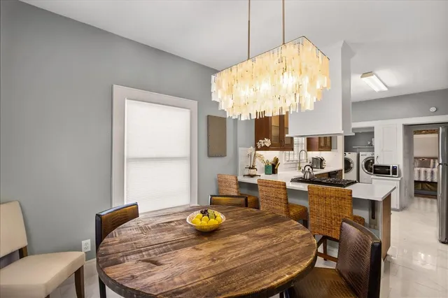 a view of a dining room with furniture