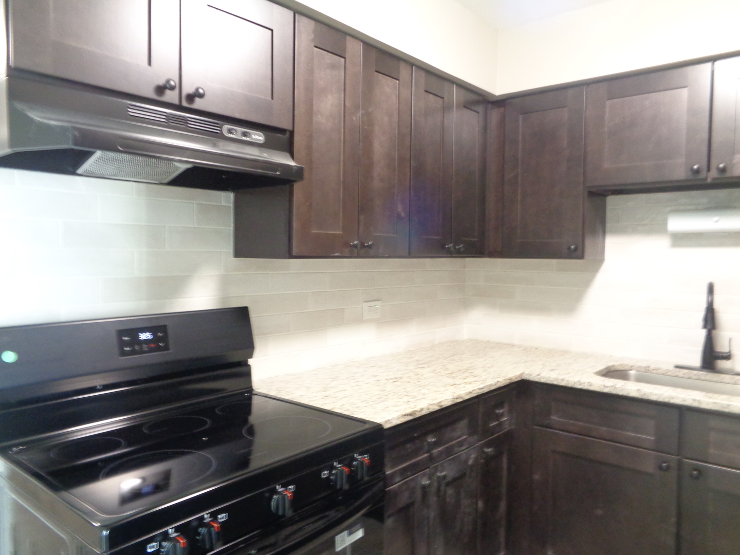 11953 South Lawndale Avenue, Unit 5C2 Alsip, IL 60803 - Photo 8 of 12 a close view of stove top oven