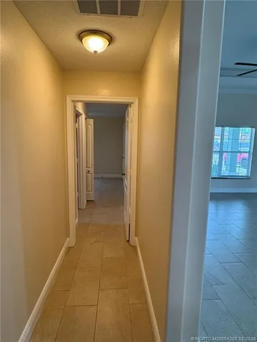 a view of a livingroom with a ceiling fan