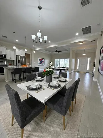 a view of a livingroom with a ceiling fan