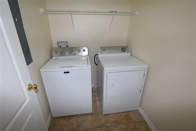 a utility room with dryer and washer