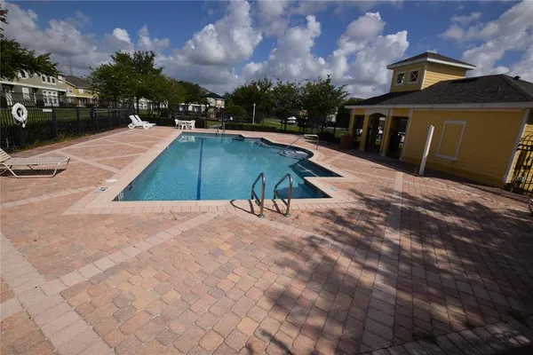 a view of a house with a swimming pool