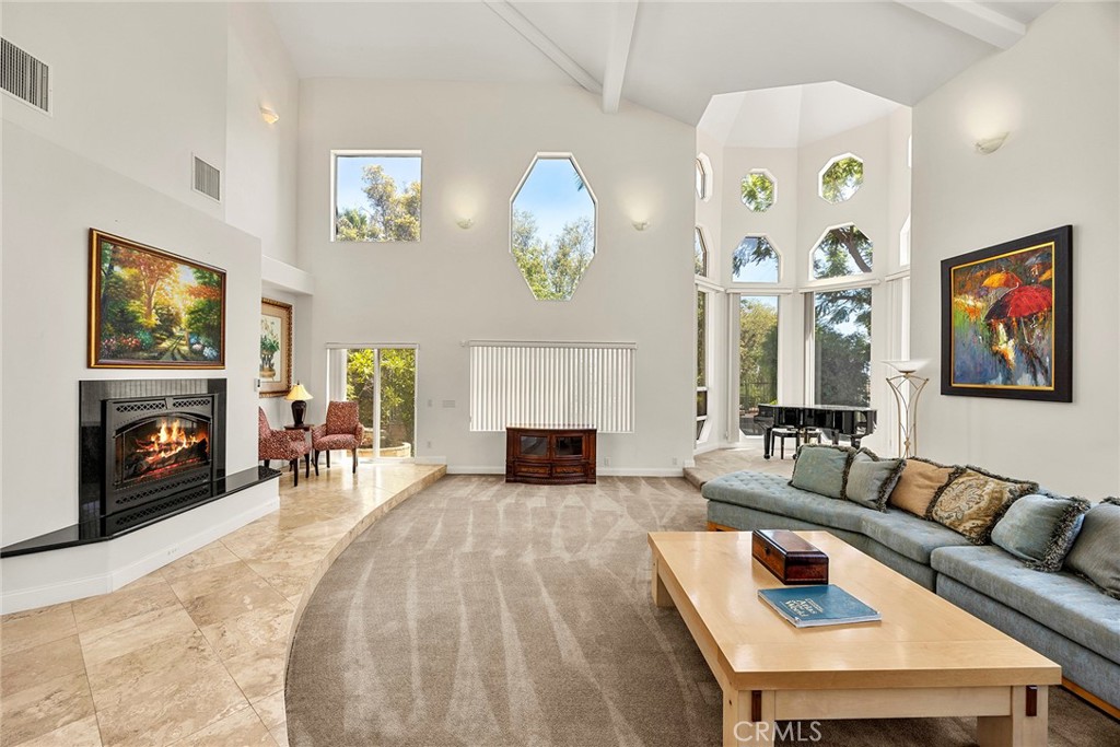 1730 Rocky Road Fullerton, CA 92831 - Photo 7 of 75 Grand Fireplace with a Raised Hesarth and a Deciated Grand Piano area.
