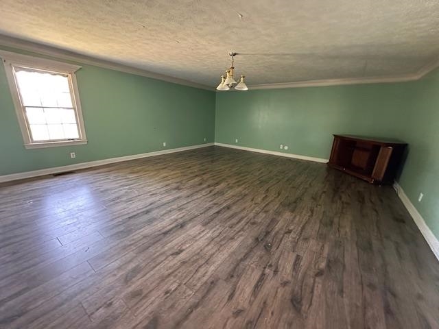 70 South Riverside Drive Savannah, TN 38372 - Photo 13 of 40 an empty room with wooden floor cabinet and windows
