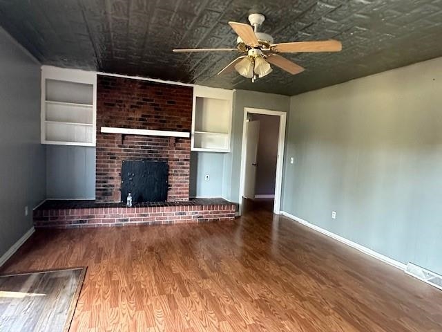 70 South Riverside Drive Savannah, TN 38372 - Photo 20 of 40 a view of empty room with stairs and wooden floor