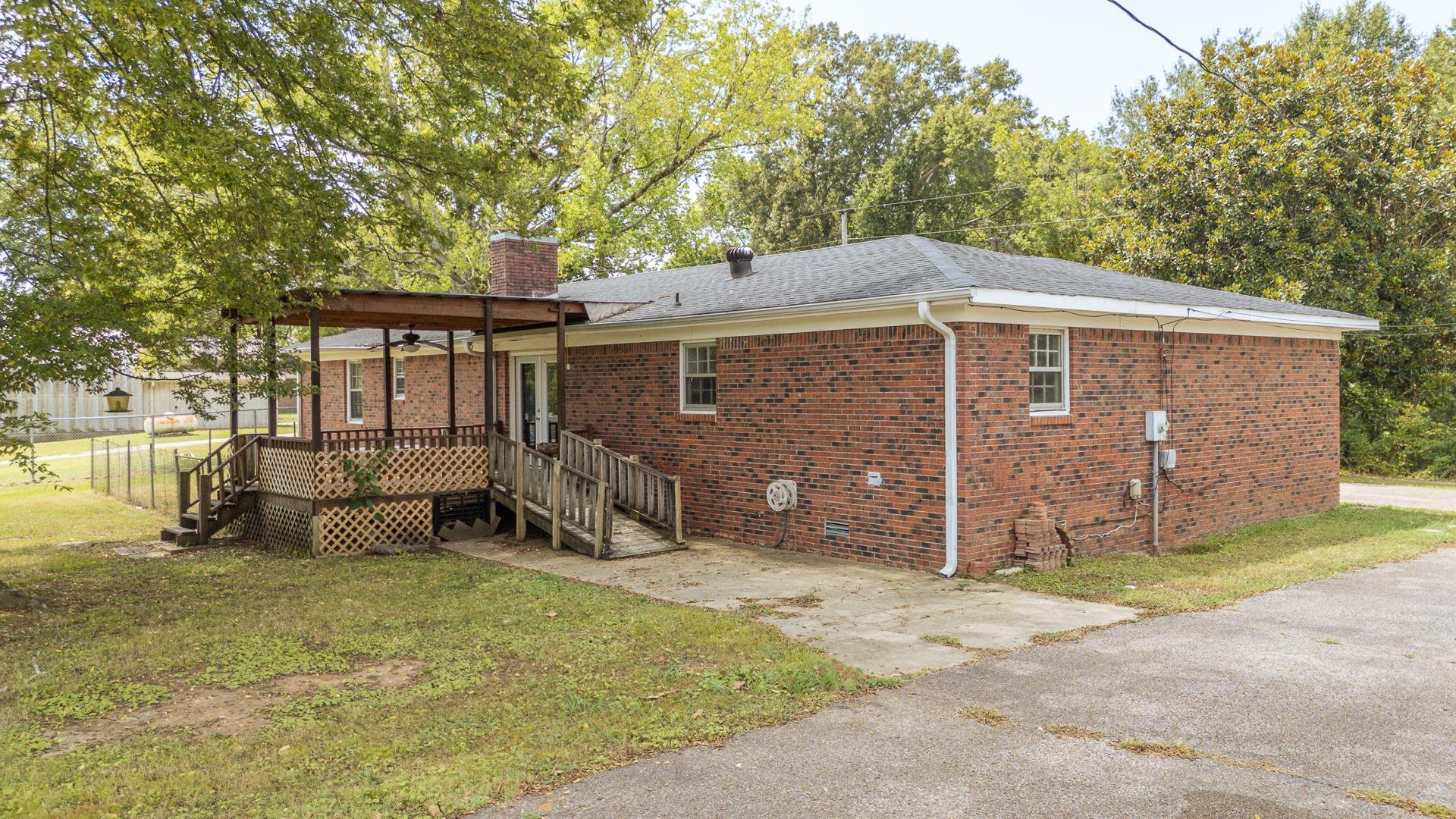 70 South Riverside Drive Savannah, TN 38372 - Photo 28 of 40 a view of a house with a yard and tree