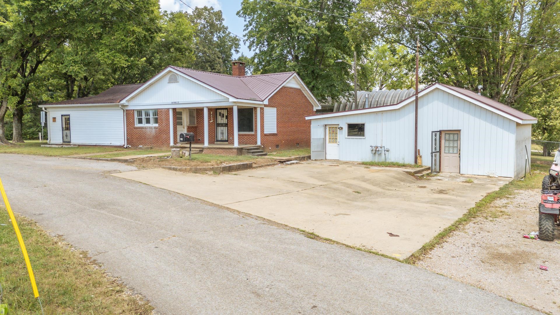 70 South Riverside Drive Savannah, TN 38372 - Photo 29 of 40 a view of a house with a yard and large trees