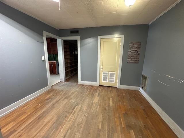 70 South Riverside Drive Savannah, TN 38372 - Photo 32 of 40 an empty room with closet and wooden floor