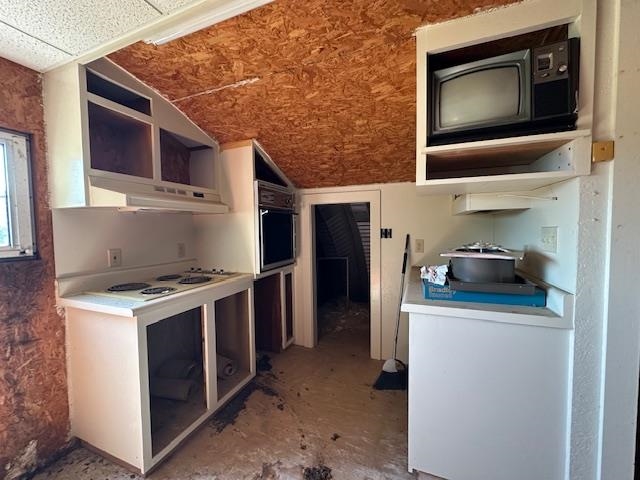 70 South Riverside Drive Savannah, TN 38372 - Photo 37 of 40 a kitchen with stainless steel appliances a stove and a microwave