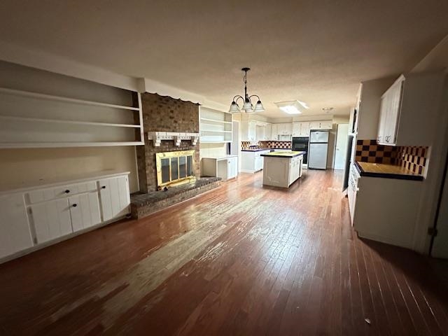 70 South Riverside Drive Savannah, TN 38372 - Photo 6 of 40 a kitchen with stainless steel appliances a stove top oven and cabinets