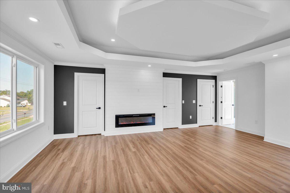 2504 Church Road Cinnaminson, NJ 08077 - Photo 31 of 79 a view of a big room with wooden floor and windows