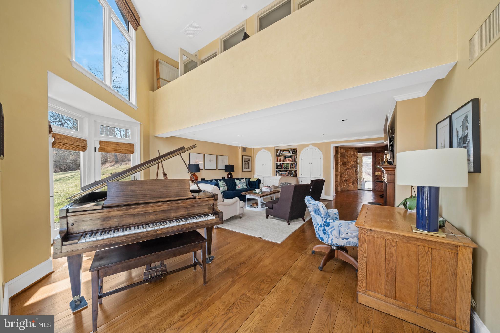 3930 Thompsons Bridge Road Wilmington, DE 19807 - Photo 12 of 69 a living room with furniture and a wooden floor