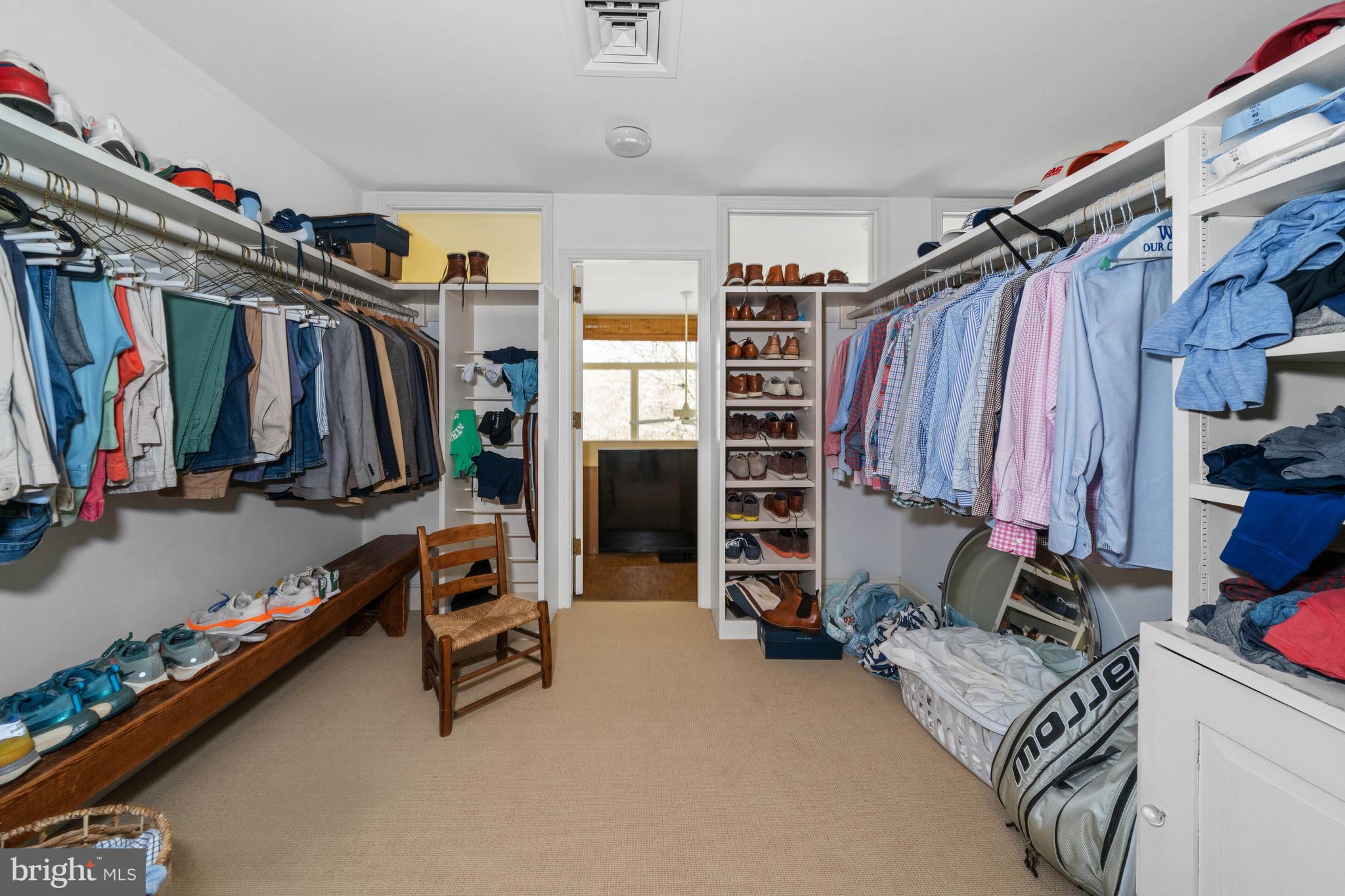 3930 Thompsons Bridge Road Wilmington, DE 19807 - Photo 35 of 69 a view of walk in closet with clothes and shoes