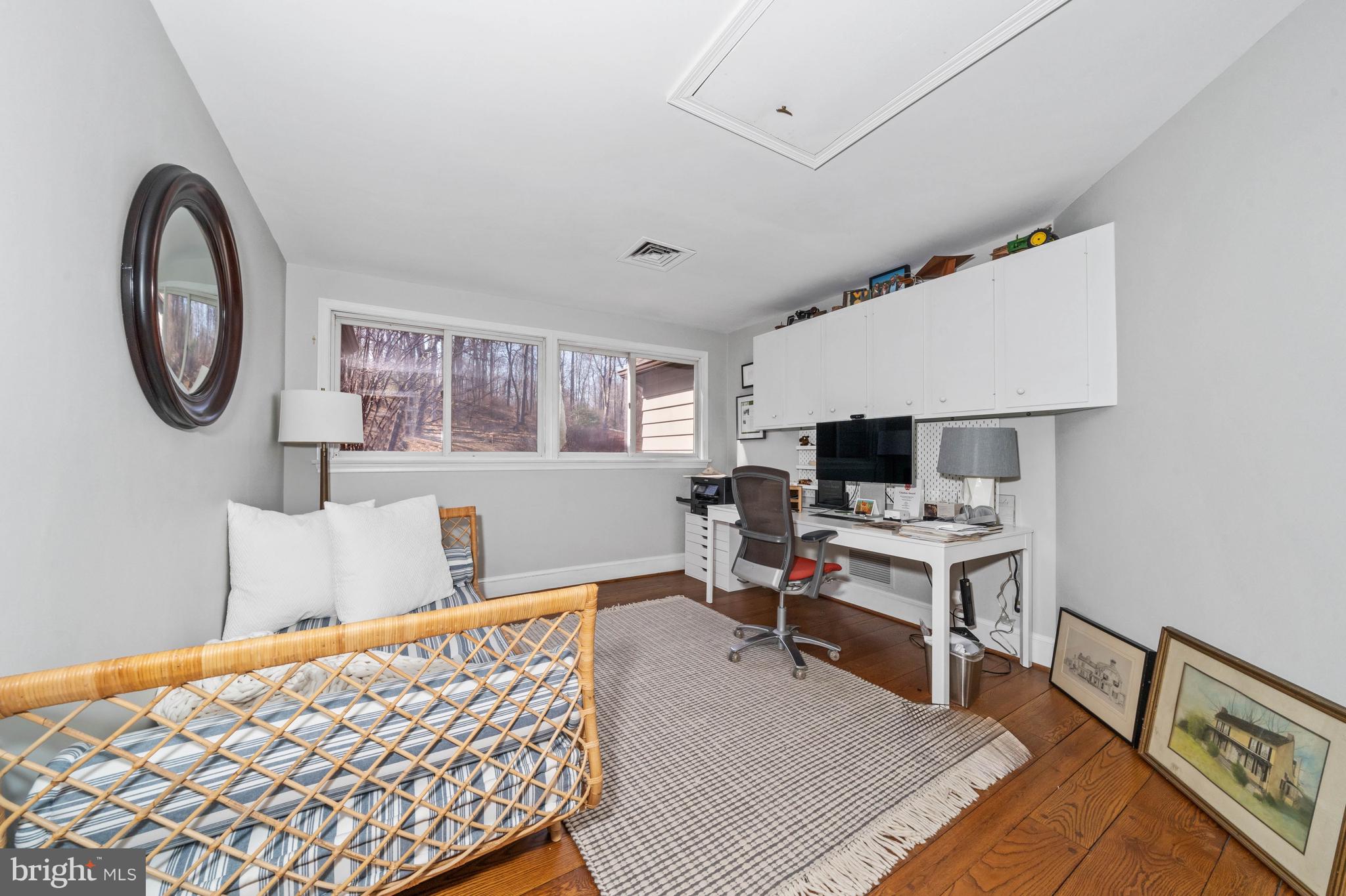 3930 Thompsons Bridge Road Wilmington, DE 19807 - Photo 47 of 69 a living room with furniture and a flat screen tv