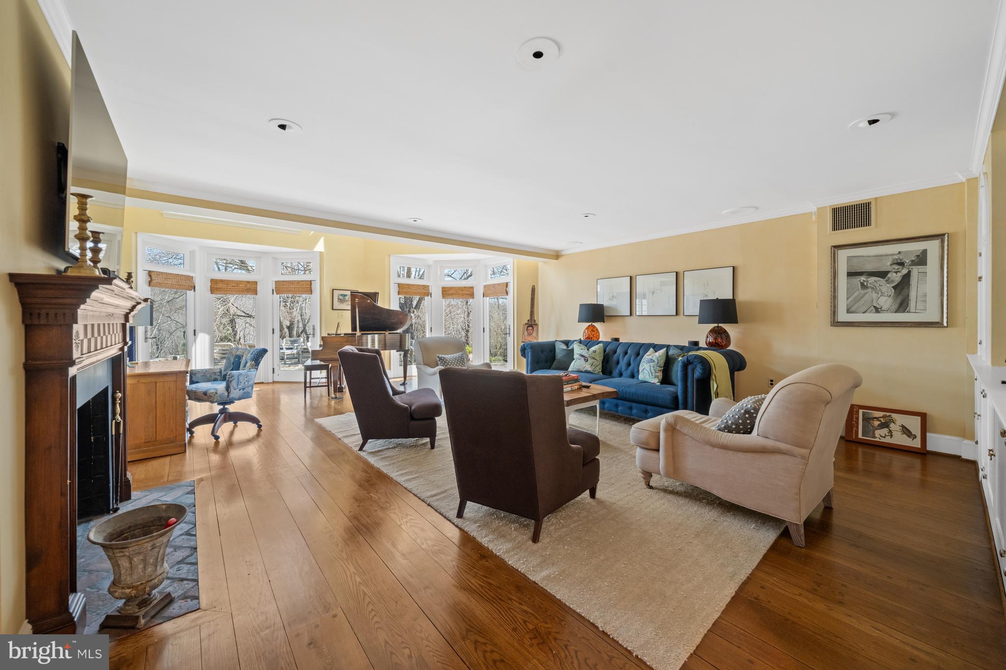 3930 Thompsons Bridge Road Wilmington, DE 19807 - Photo 8 of 69 a living room with furniture and a flat screen tv
